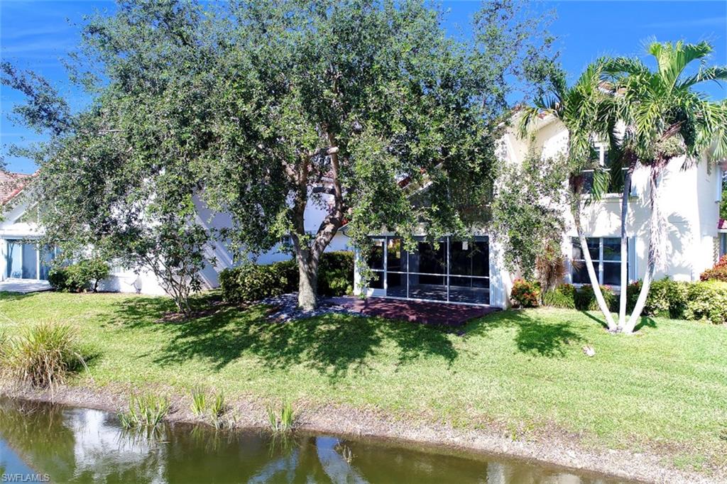 3578 Midas Place Naples, FL 34105 - Photo 20 of 21 a view of a house with a yard