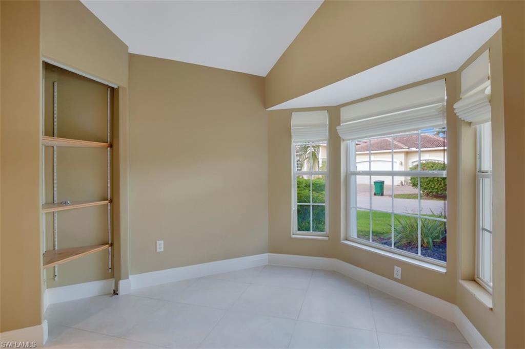 3578 Midas Place Naples, FL 34105 - Photo 9 of 21 a view of an empty room with a window