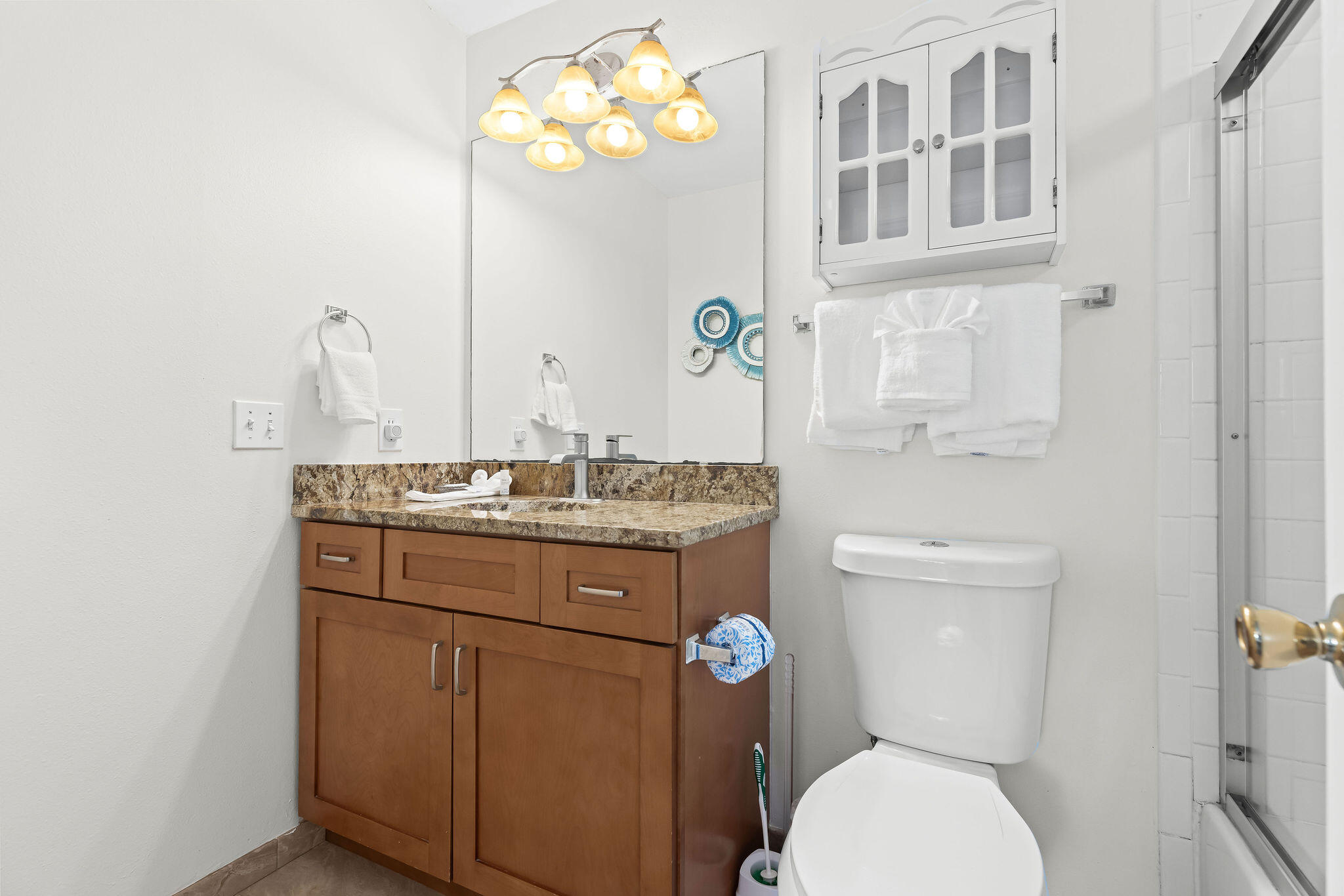 91 Matthew Boulevard Destin, FL 32541 - Photo 70 of 85 a bathroom with a granite countertop toilet sink and mirror