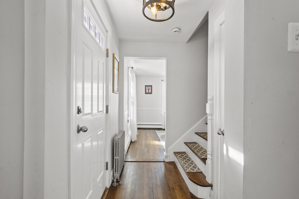 446 Ralph Talbot Street Weymouth, MA 02190 - Photo 13 of 28 a view of an entryway with wooden floor