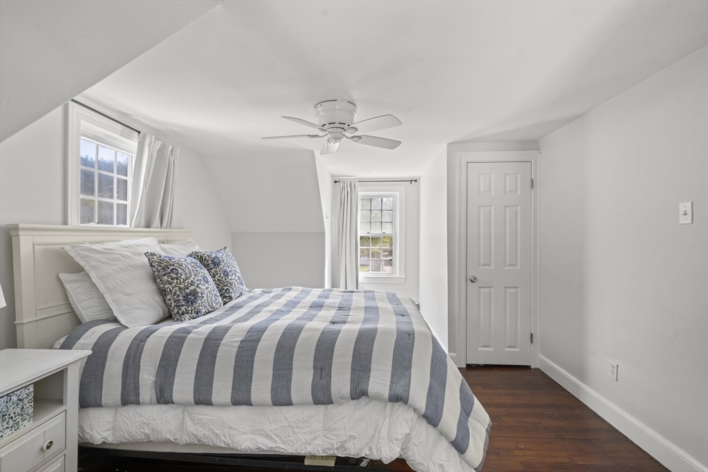 446 Ralph Talbot Street Weymouth, MA 02190 - Photo 15 of 28 a bedroom with a bed and window
