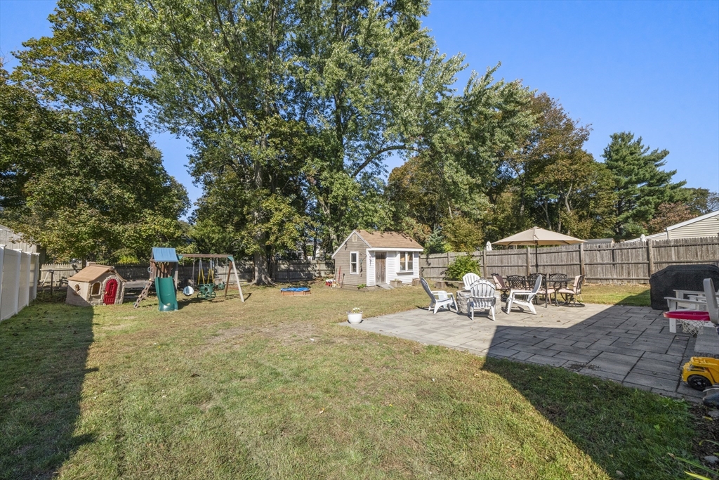 446 Ralph Talbot Street Weymouth, MA 02190 - Photo 26 of 28 a view of a house with backyard and sitting area