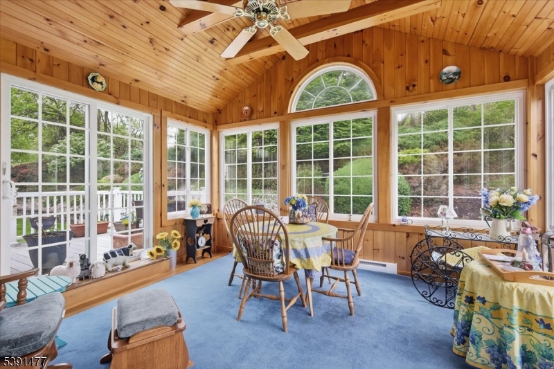 42 Copper Penny Road Flemington, NJ 08822 - Photo 11 of 39 a view of a dining room with furniture large windows and wooden floor