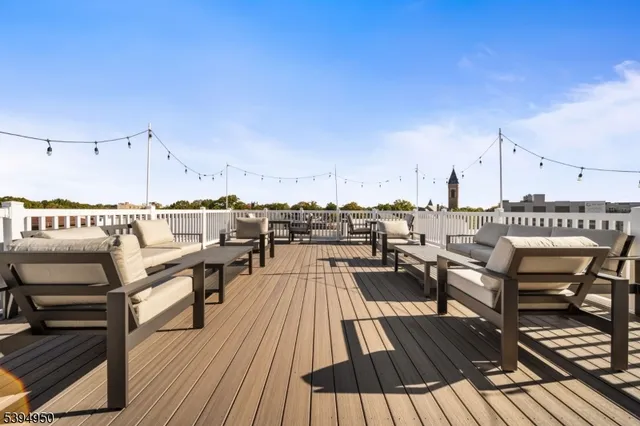 a view of a terrace with seating area