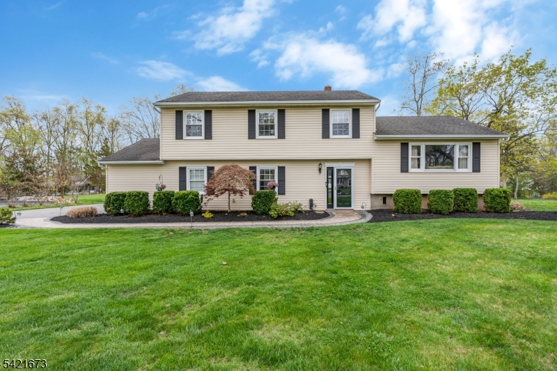 496 Rolling Hills Road Bridgewater, NJ 08807 - Photo 2 of 45 a front view of house with yard and green space