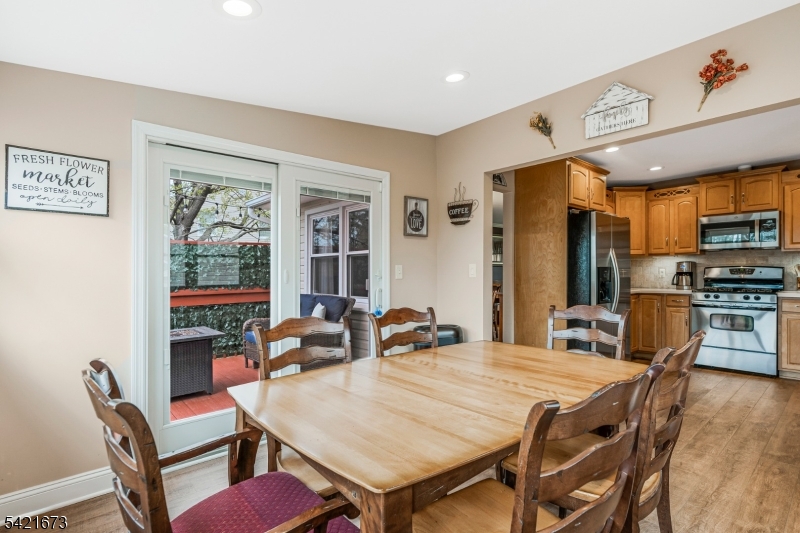 496 Rolling Hills Road Bridgewater, NJ 08807 - Photo 21 of 45 a dining room with furniture and window