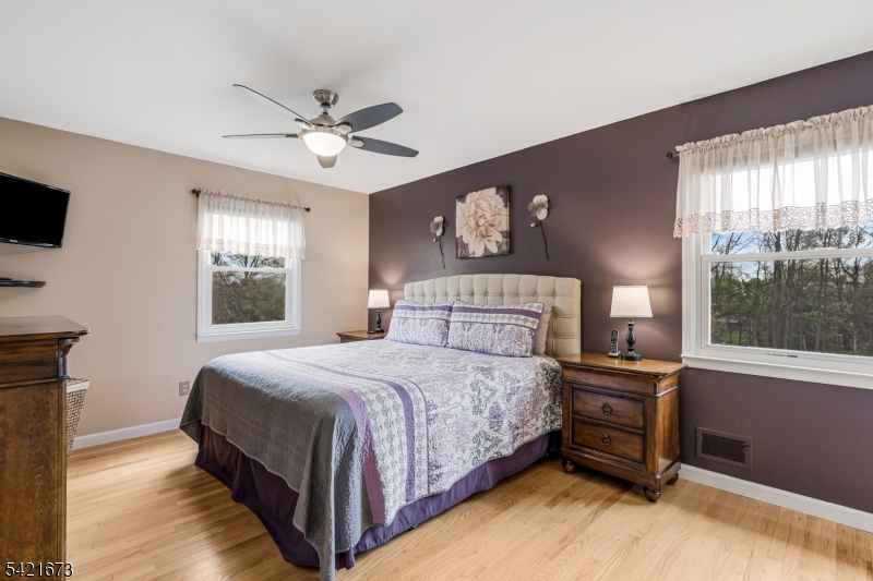 496 Rolling Hills Road Bridgewater, NJ 08807 - Photo 23 of 45 a bedroom with a bed and a window