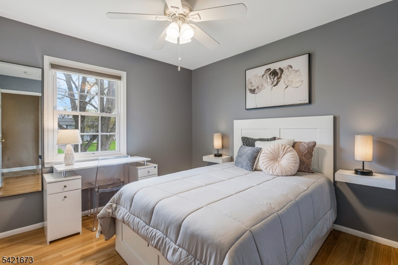 496 Rolling Hills Road Bridgewater, NJ 08807 - Photo 26 of 45 a bedroom with a large bed and a window