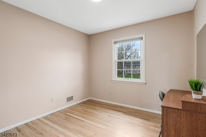 496 Rolling Hills Road Bridgewater, NJ 08807 - Photo 28 of 45 a view of an empty room with a window