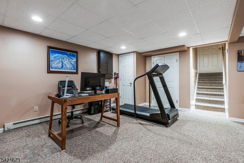 496 Rolling Hills Road Bridgewater, NJ 08807 - Photo 30 of 45 a view of a room with gym equipment