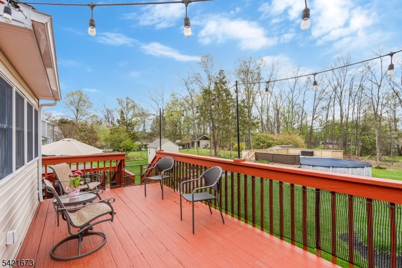 496 Rolling Hills Road Bridgewater, NJ 08807 - Photo 34 of 45 a view of a chairs and table in patio