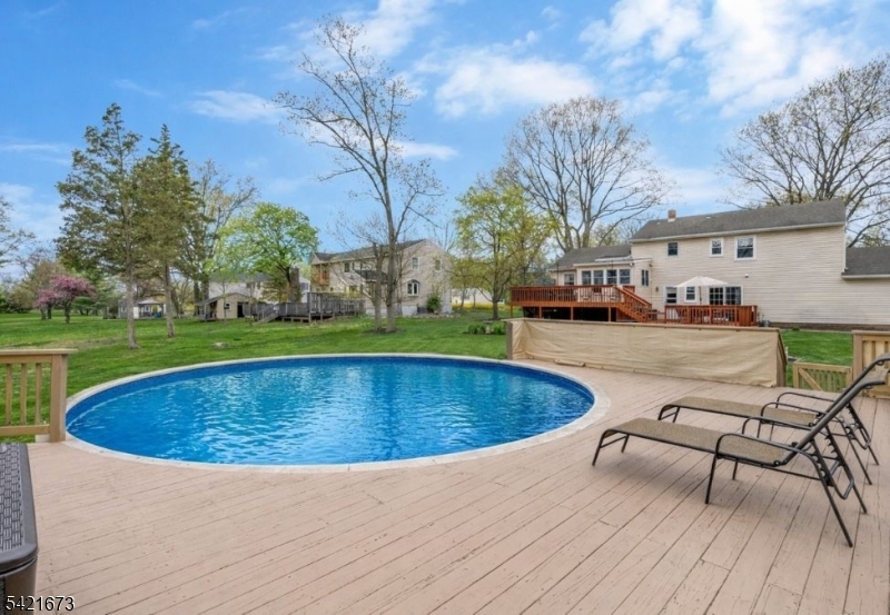 496 Rolling Hills Road Bridgewater, NJ 08807 - Photo 37 of 45 a view of outdoor space yard swimming pool and patio