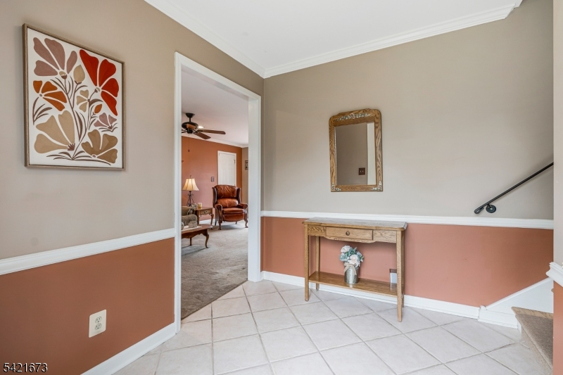 496 Rolling Hills Road Bridgewater, NJ 08807 - Photo 9 of 45 a room with furniture and view of living room