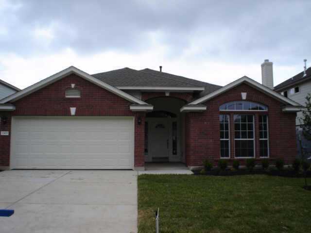 10409 Huxley Street Austin, TX 78748 - Photo 1 of 1 a front view of a house with a garden