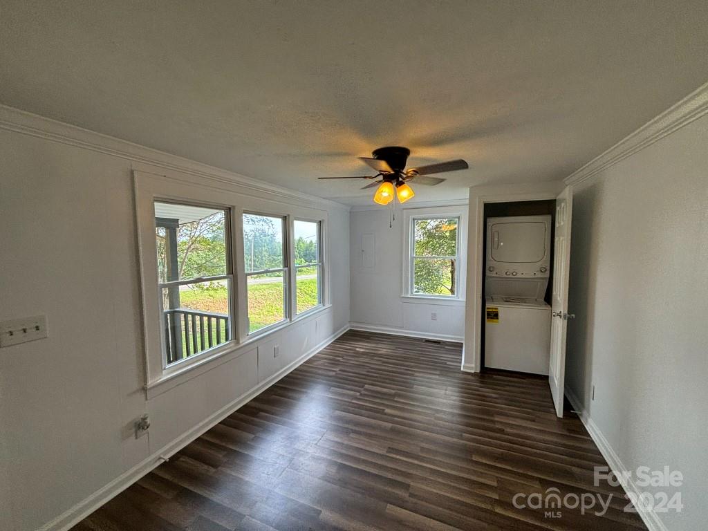 5397 Hope Road Vale, NC 28168 - Photo 14 of 32 a view of an empty room with window and wooden floor