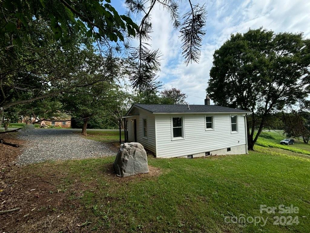 5397 Hope Road Vale, NC 28168 - Photo 3 of 32 a view of a house with a yard