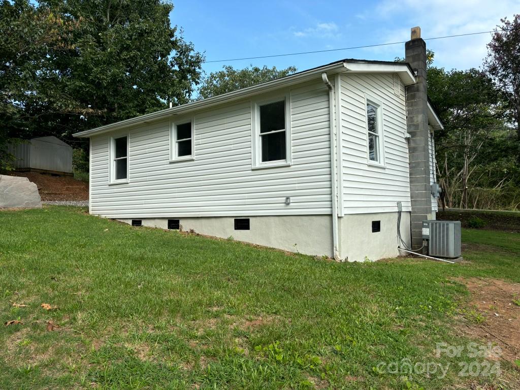 5397 Hope Road Vale, NC 28168 - Photo 6 of 32 a front view of a house with a yard