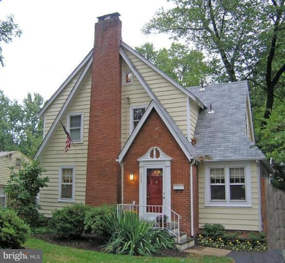 8605 Mayfair Place Silver Spring, MD 20910 - Photo 1 of 23 a front view of a house with garden