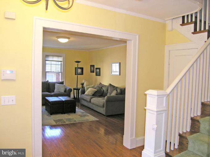 8605 Mayfair Place Silver Spring, MD 20910 - Photo 11 of 23 a living room with furniture and a wooden floor
