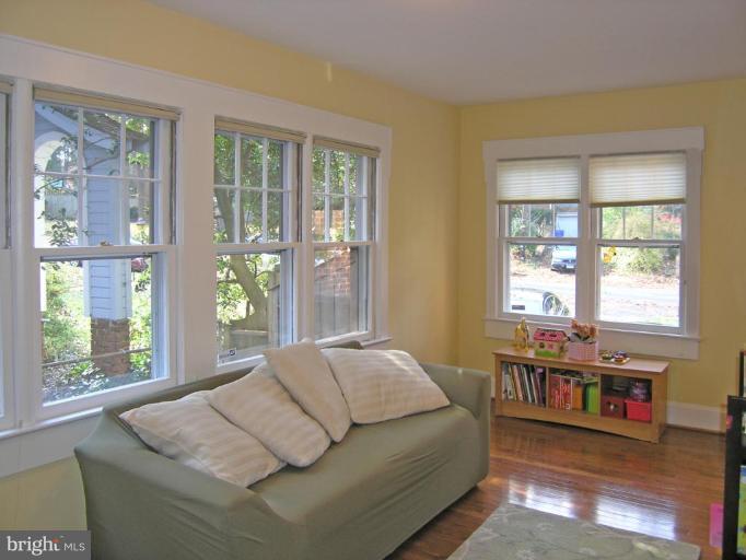 8605 Mayfair Place Silver Spring, MD 20910 - Photo 23 of 23 a living room with furniture and large windows