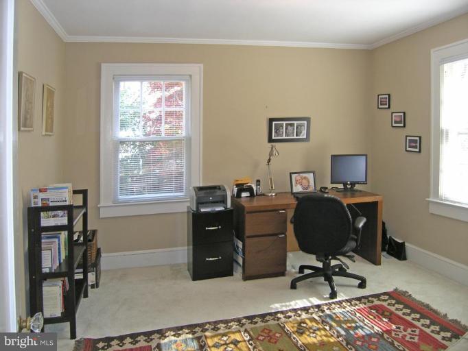 8605 Mayfair Place Silver Spring, MD 20910 - Photo 6 of 23 a view of workspace with wooden floor windows