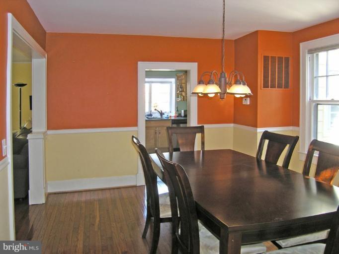 8605 Mayfair Place Silver Spring, MD 20910 - Photo 8 of 23 a view of a dining room with furniture and window