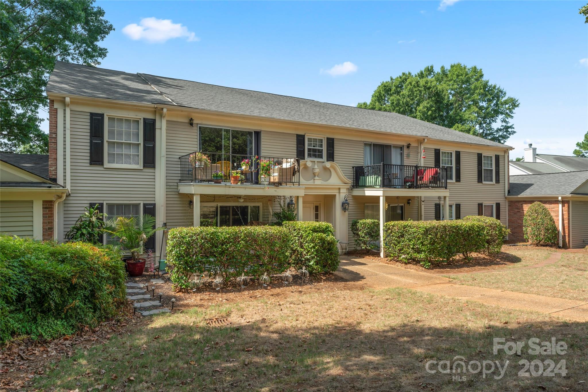 7035 Quail Hill Road Charlotte, NC 28210 - Photo 33 of 40 a front view of a house with a yard