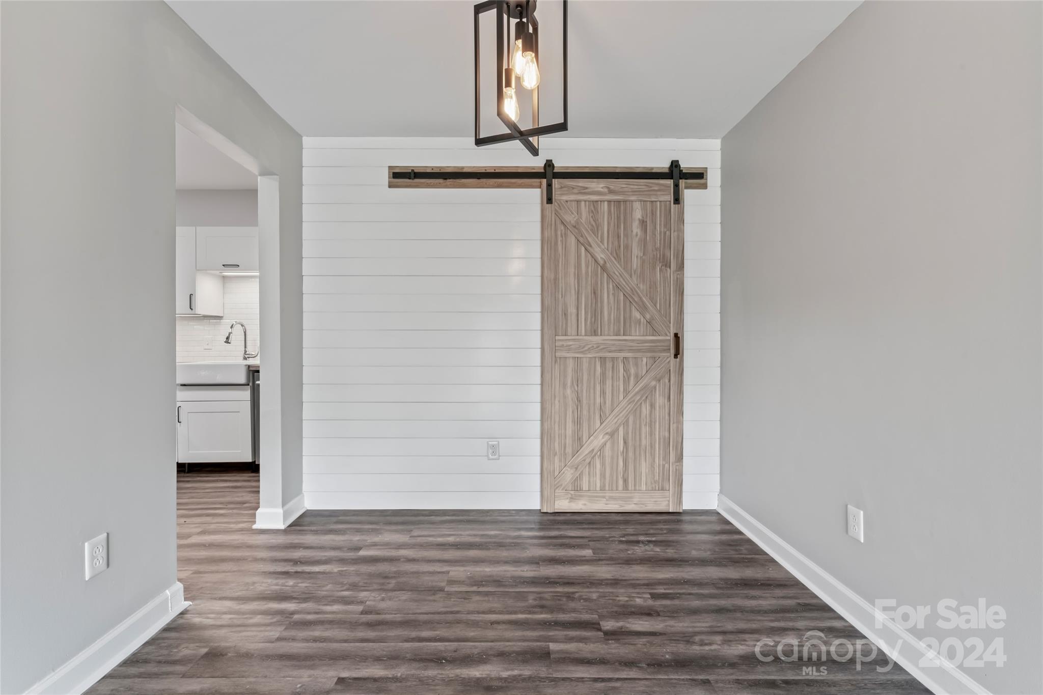 7035 Quail Hill Road Charlotte, NC 28210 - Photo 10 of 40 wooden floor in an empty room