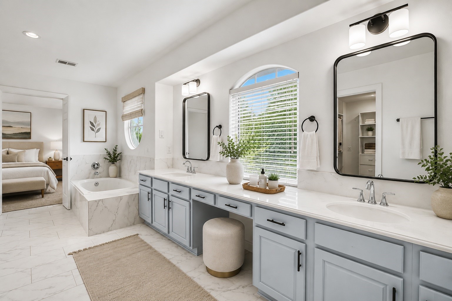 1470 Springrock Lane, Unit 6 Houston, TX 77055 - Photo 16 of 31 Updated primary bathroom featuring double sinks and vanity area. Virtually staged.