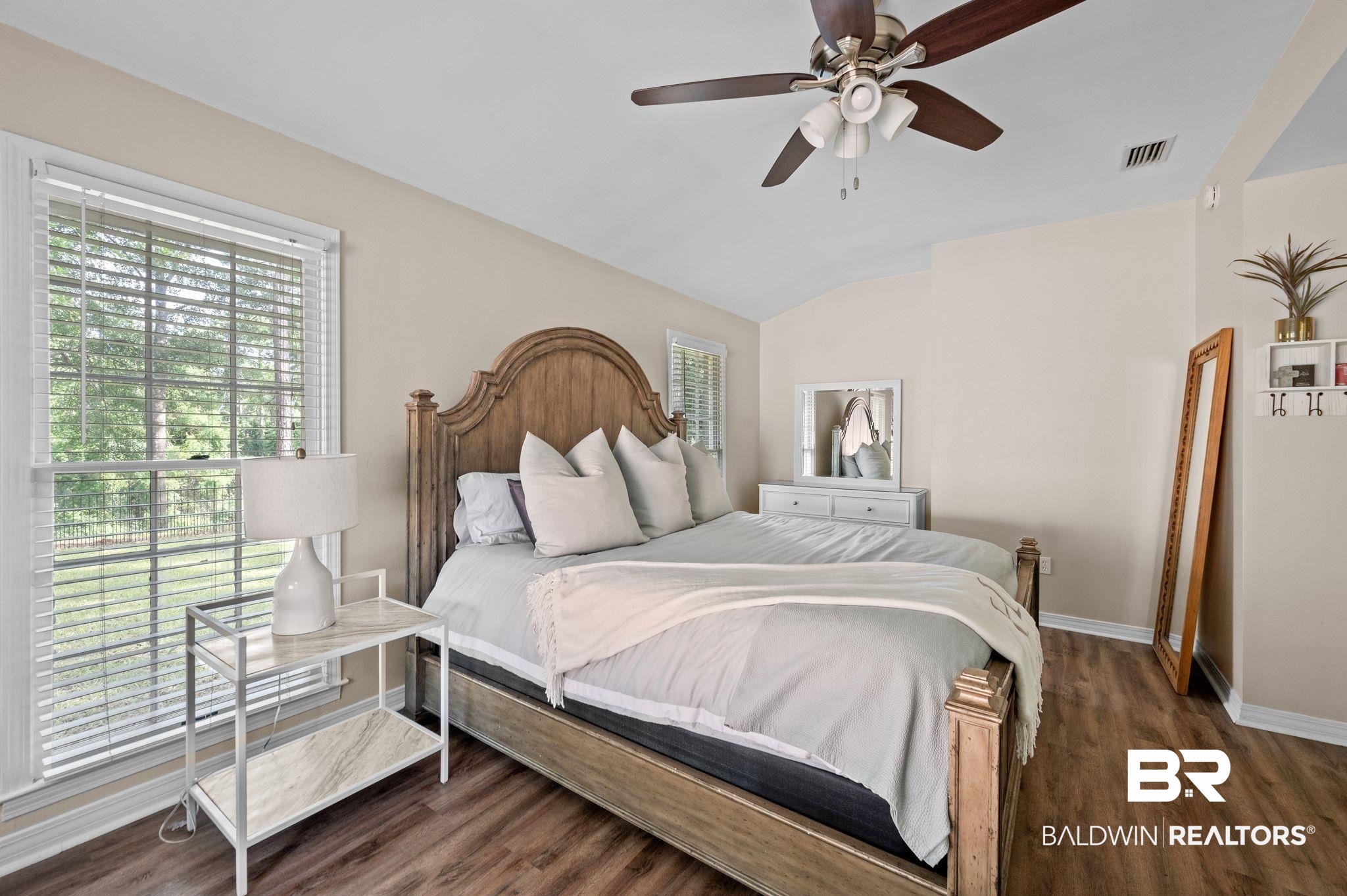 110 Ferncliff Circle Daphne, AL 36526 - Photo 20 of 40 Bedroom featuring baseboards, wood finished floors, vaulted ceiling, and a ceiling fan