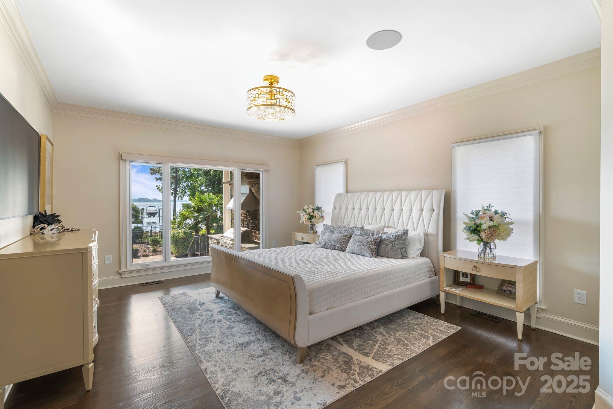 17819 John Connor Road Cornelius, NC 28031 - Photo 19 of 48 a bedroom with a large bed and a window