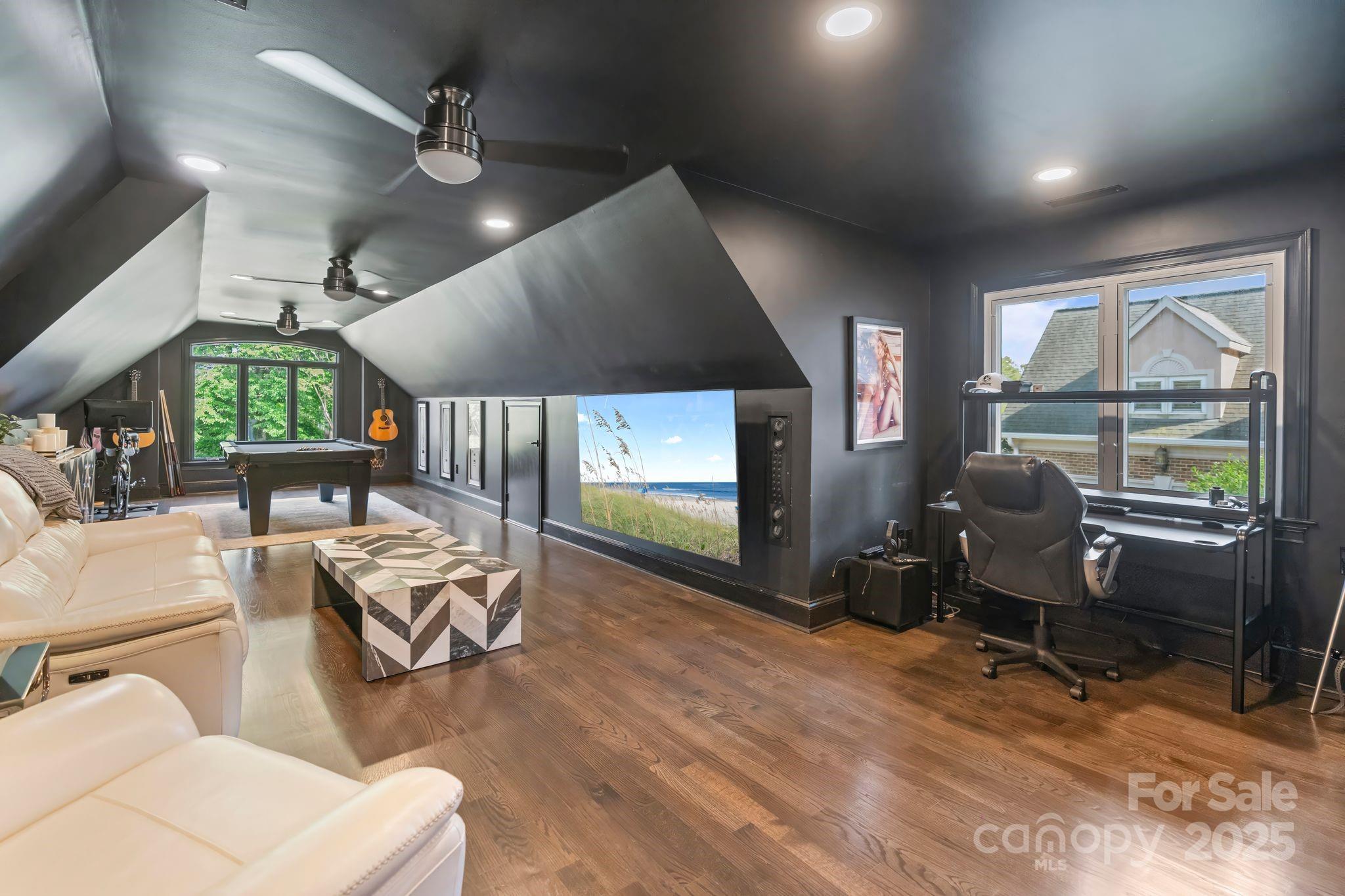 17819 John Connor Road Cornelius, NC 28031 - Photo 25 of 48 a living room with furniture and a large window