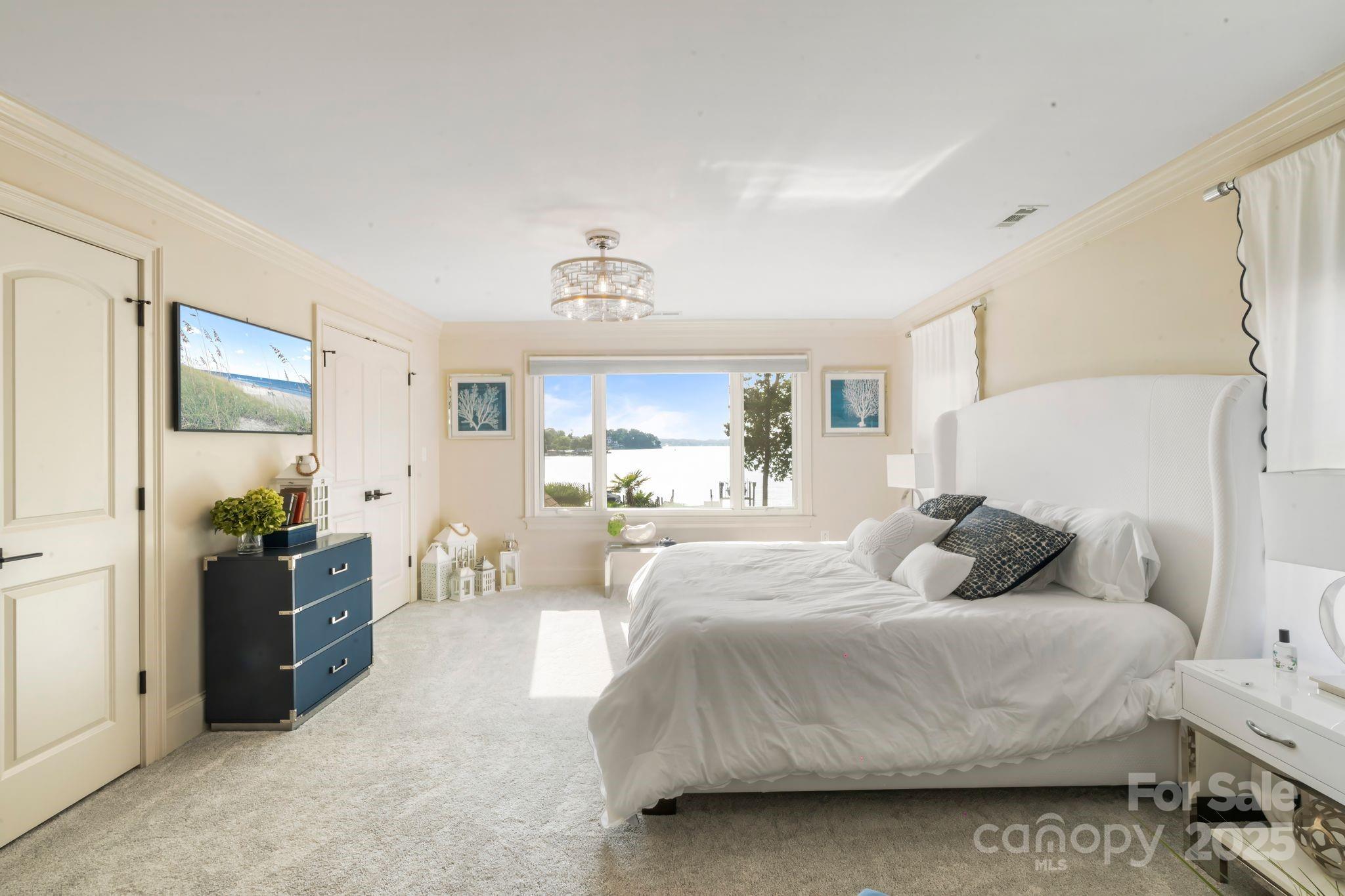 17819 John Connor Road Cornelius, NC 28031 - Photo 29 of 48 a bedroom with a bed and a couch