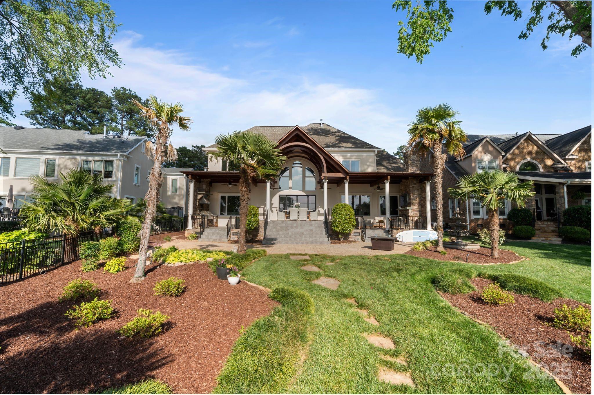 17819 John Connor Road Cornelius, NC 28031 - Photo 43 of 48 a front view of a house with swimming pool outdoor seating