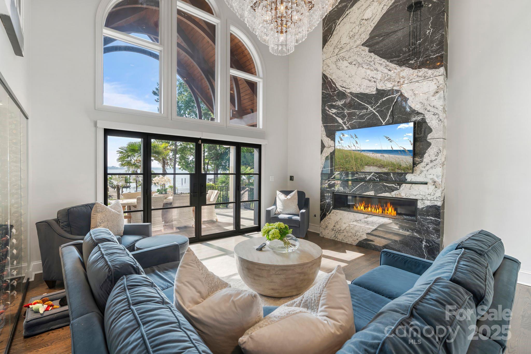 17819 John Connor Road Cornelius, NC 28031 - Photo 8 of 48 a living room with furniture and a large window