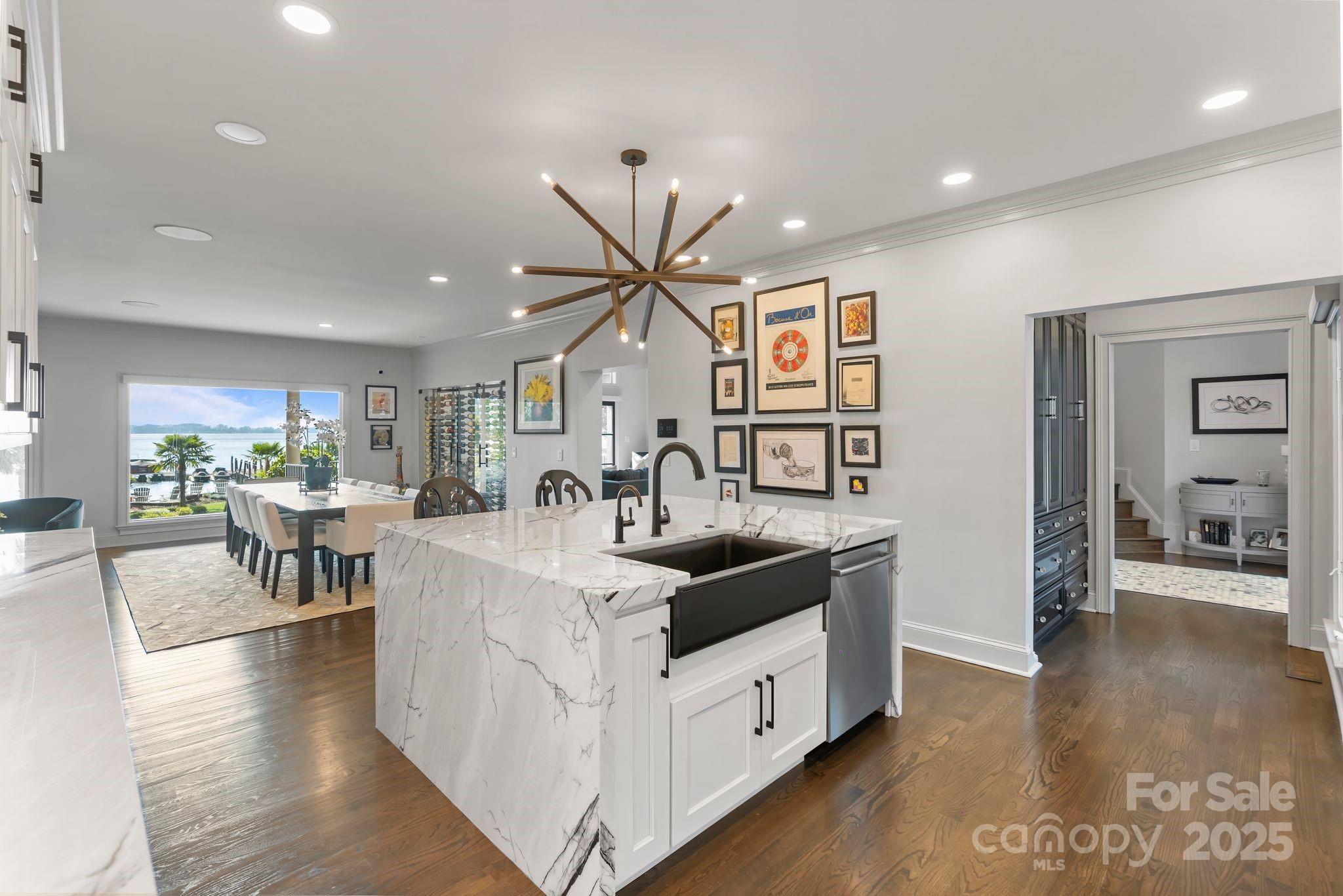 17819 John Connor Road Cornelius, NC 28031 - Photo 10 of 48 a kitchen with stainless steel appliances granite countertop a sink and a refrigerator