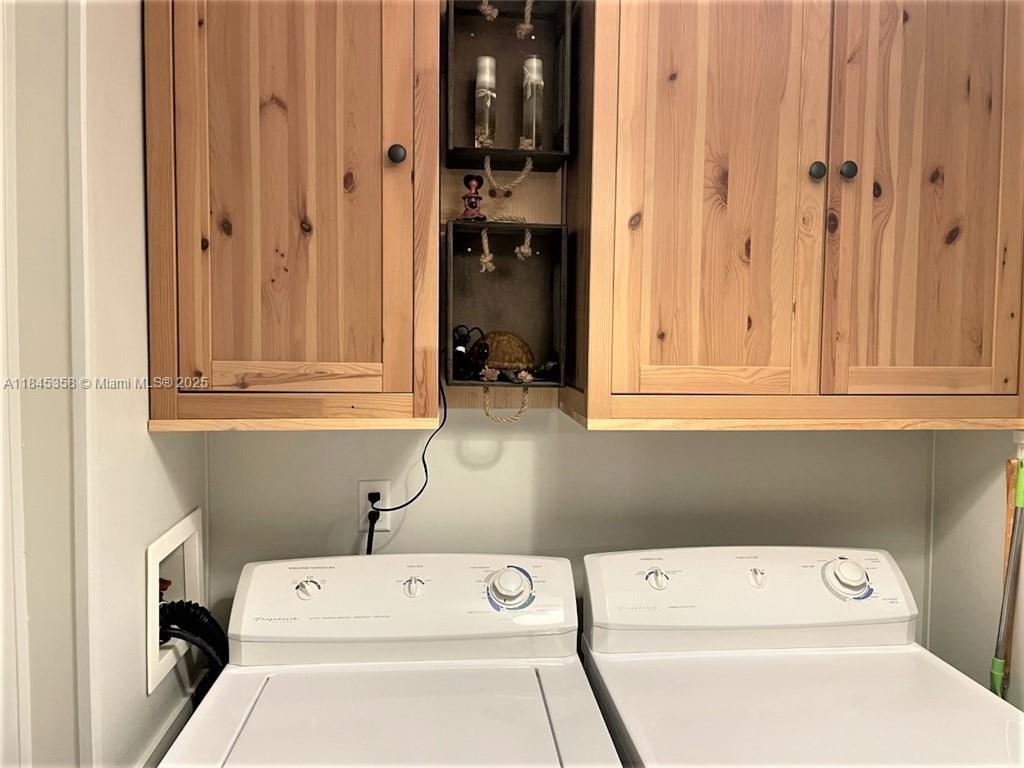 8671 Southwest 18th Place Davie, FL 33324 - Photo 16 of 22 a utility room with dryer and washer