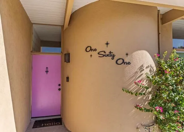 a bathroom with a potted plant