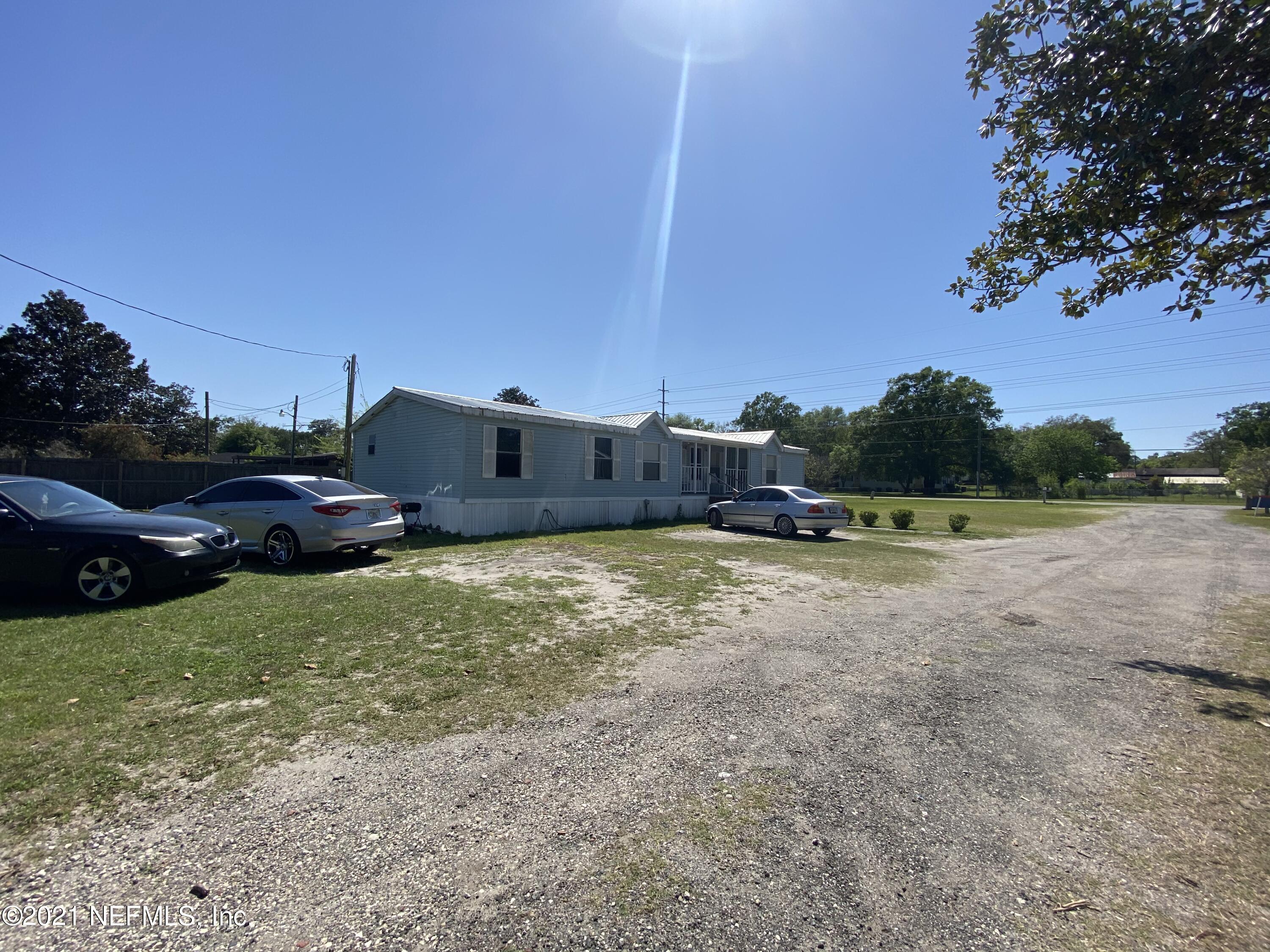 6427 Firestone Road Jacksonville, FL 32244 - Photo 31 of 55 a view of outdoor space and yard