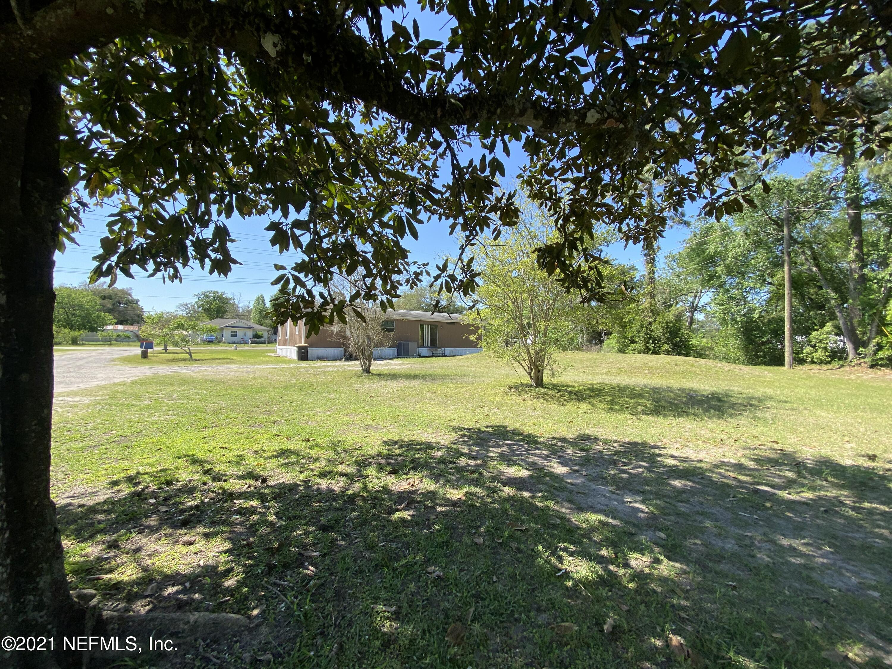 6427 Firestone Road Jacksonville, FL 32244 - Photo 49 of 55 a view of yard with green space