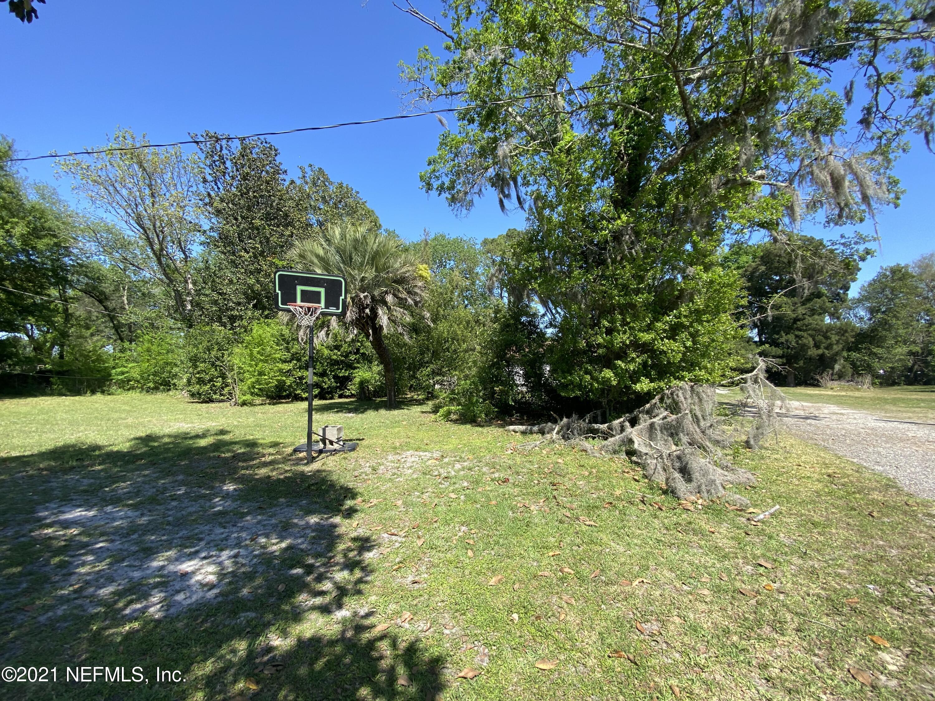 6427 Firestone Road Jacksonville, FL 32244 - Photo 51 of 55 a view of backyard with green space