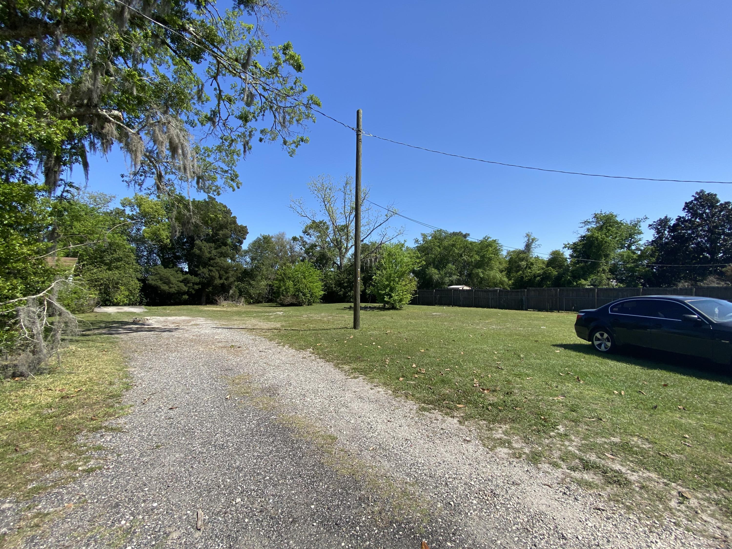 6427 Firestone Road Jacksonville, FL 32244 - Photo 53 of 55 a view of a backyard