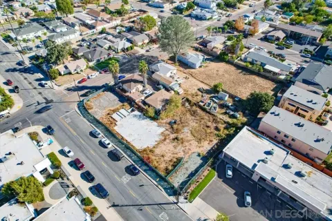 an aerial view of a house with swimming pool