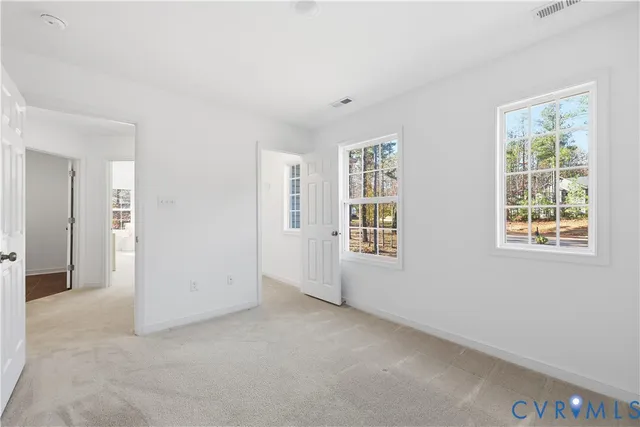 an empty room with windows