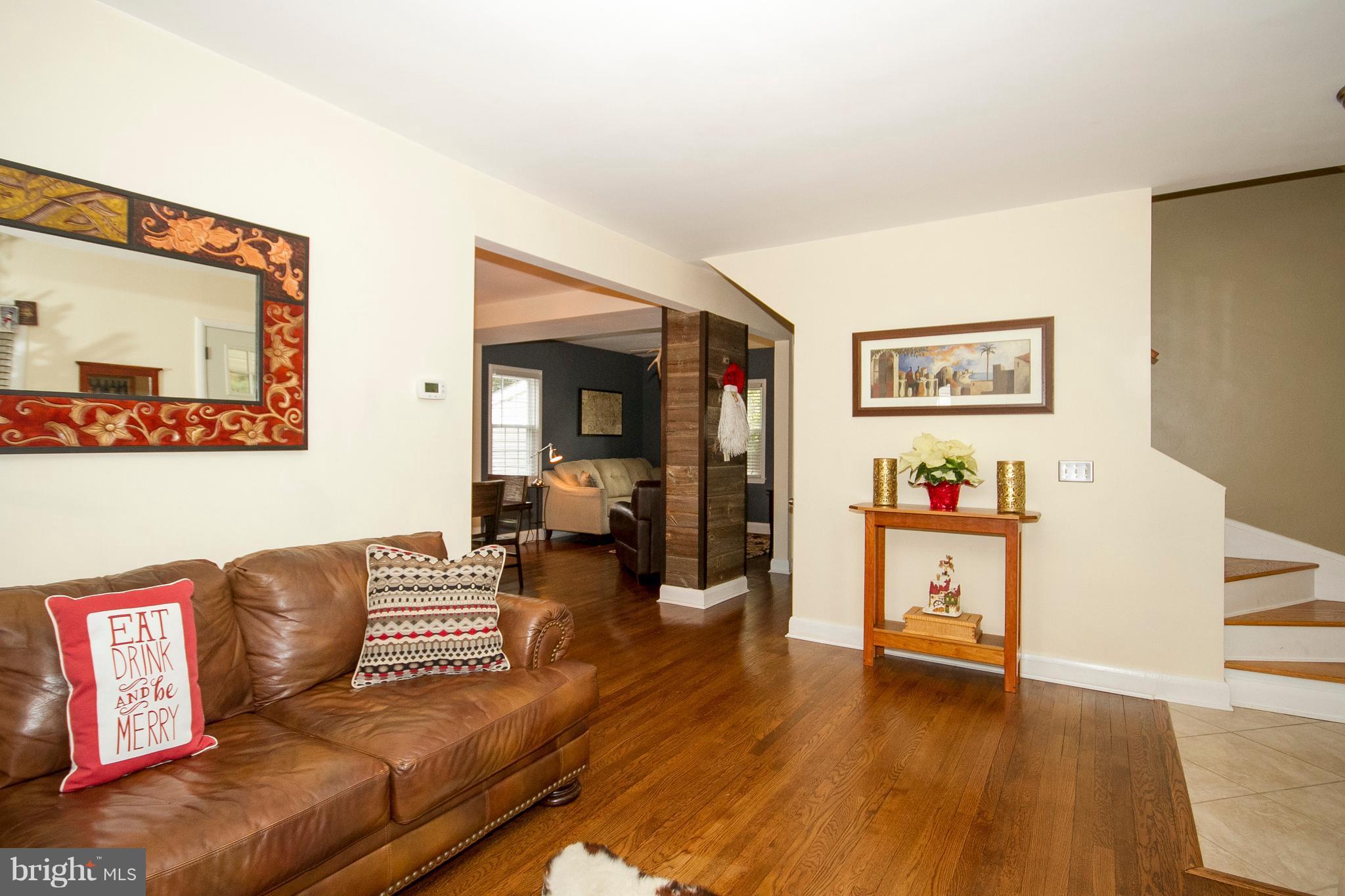 23 Hilltop Road Towson, MD 21286 - Photo 3 of 27 Large opening to dining and family room.