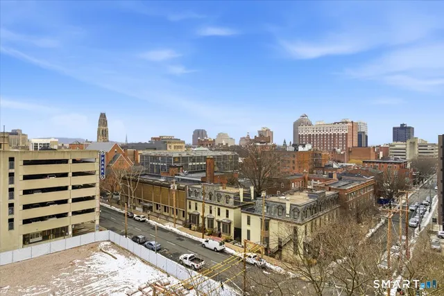 a view of a city with tall buildings