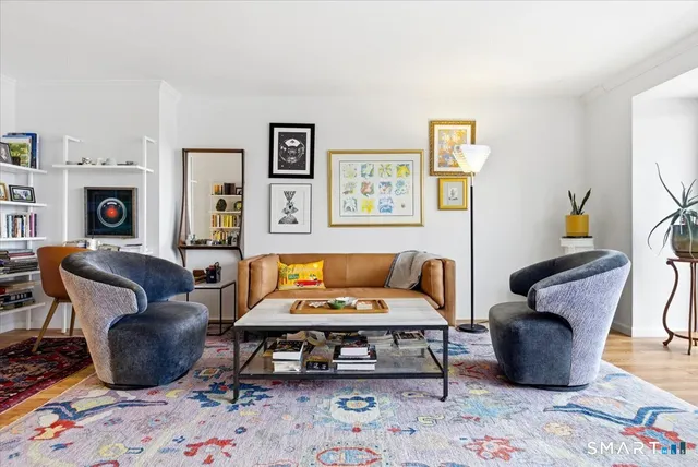 a living room with furniture and a couch