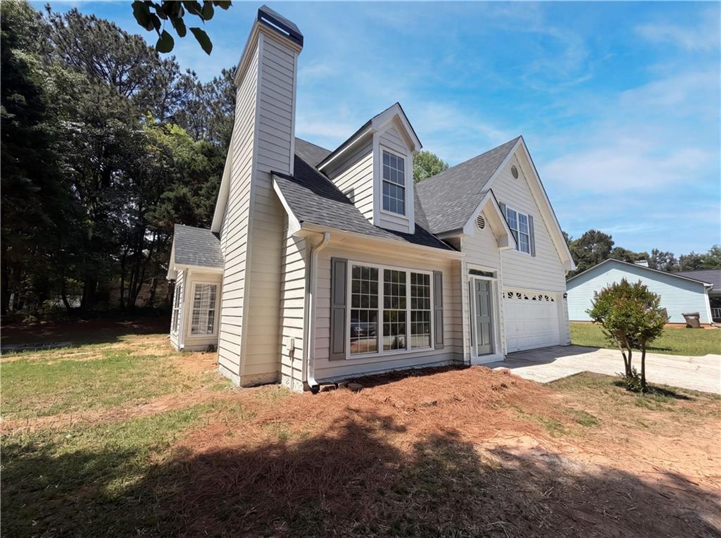722 Ridgetop Road Bethlehem, GA 30620 - Photo 3 of 23 a front view of a house with a yard
