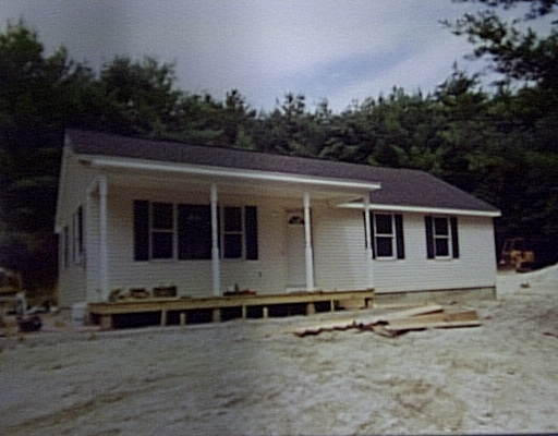 55 Stafford Road Monson, MA 01057 - Photo 1 of 1 a view of a house and yard
