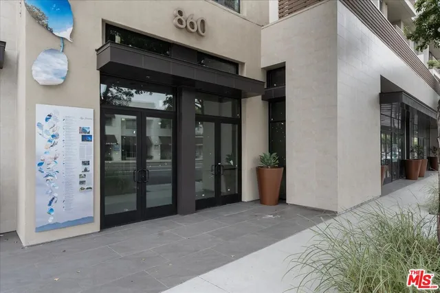 a view of a hallway with elevator